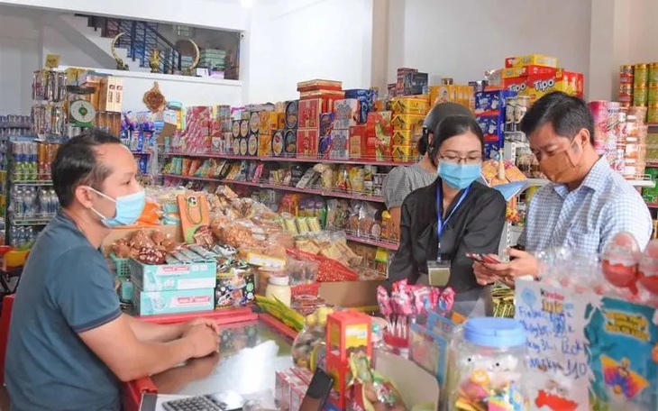 Bộ Tài chính: Thủ tục thuế với hộ kinh doanh có doanh thu dưới 1 tỷ đồng 'rất đơn giản'- Ảnh 2.